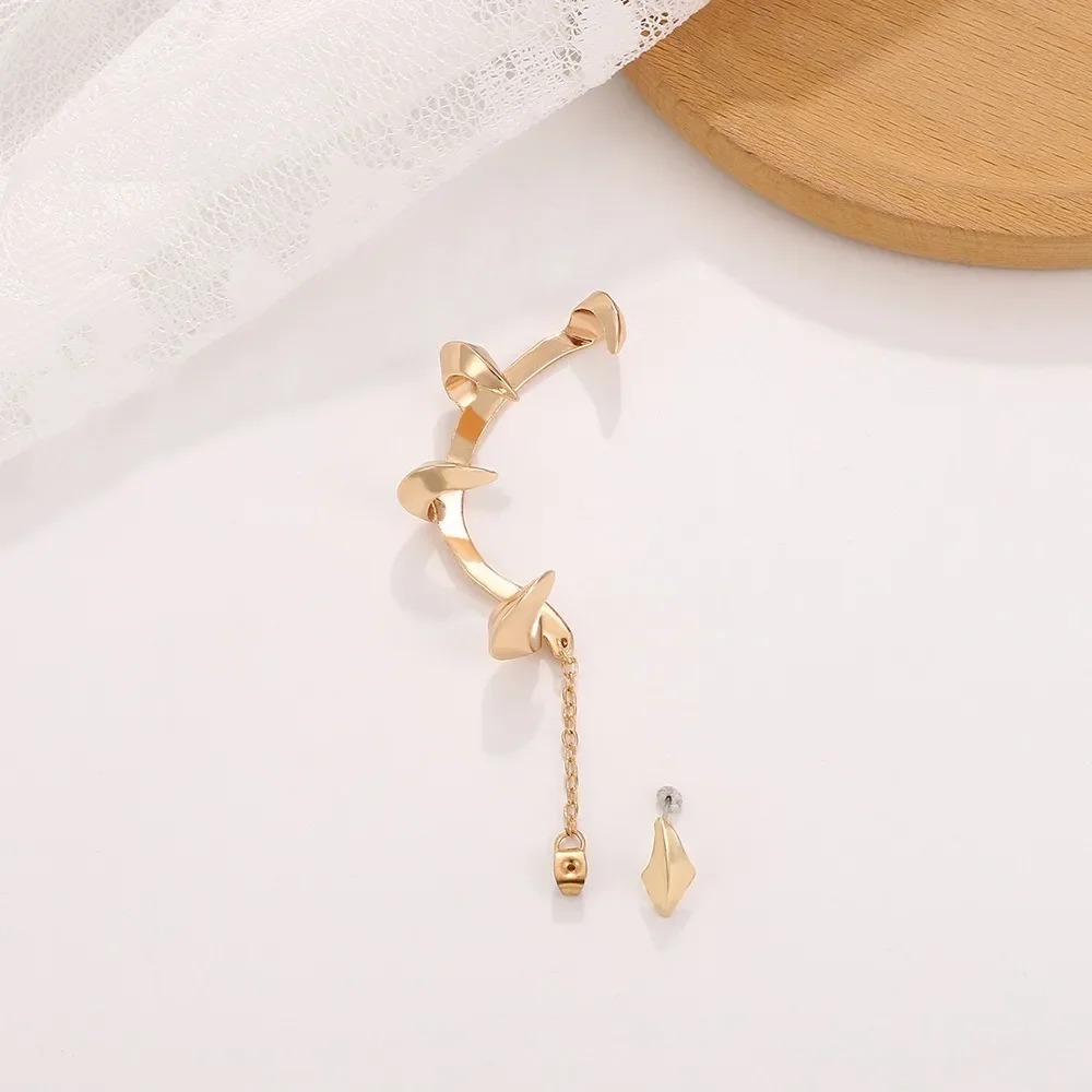 Clip de oreja con dientes afil - Street Fashion Earrings reseña y precio